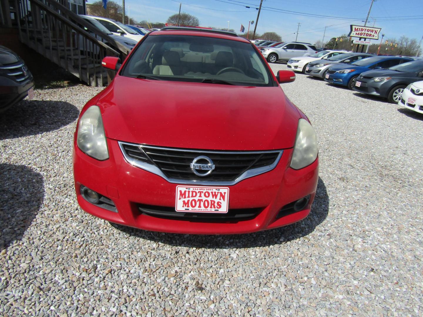 2012 Red /Tan Nissan Altima 2.5 S 6M/T Coupe (1N4AL2EP0CC) with an 2.5L L4 DOHC 16V engine, Automatic transmission, located at 15016 S Hwy 231, Midland City, AL, 36350, (334) 983-3001, 31.306210, -85.495277 - Photo#1