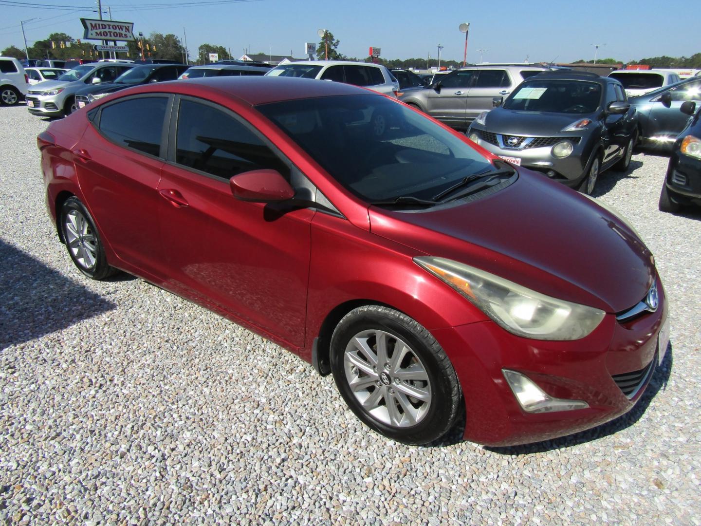 2016 Red /Gray Hyundai Elantra Limited (5NPDH4AE2GH) with an 1.8L L4 DOHC 16V engine, Automatic transmission, located at 15016 S Hwy 231, Midland City, AL, 36350, (334) 983-3001, 31.306210, -85.495277- Photo#0