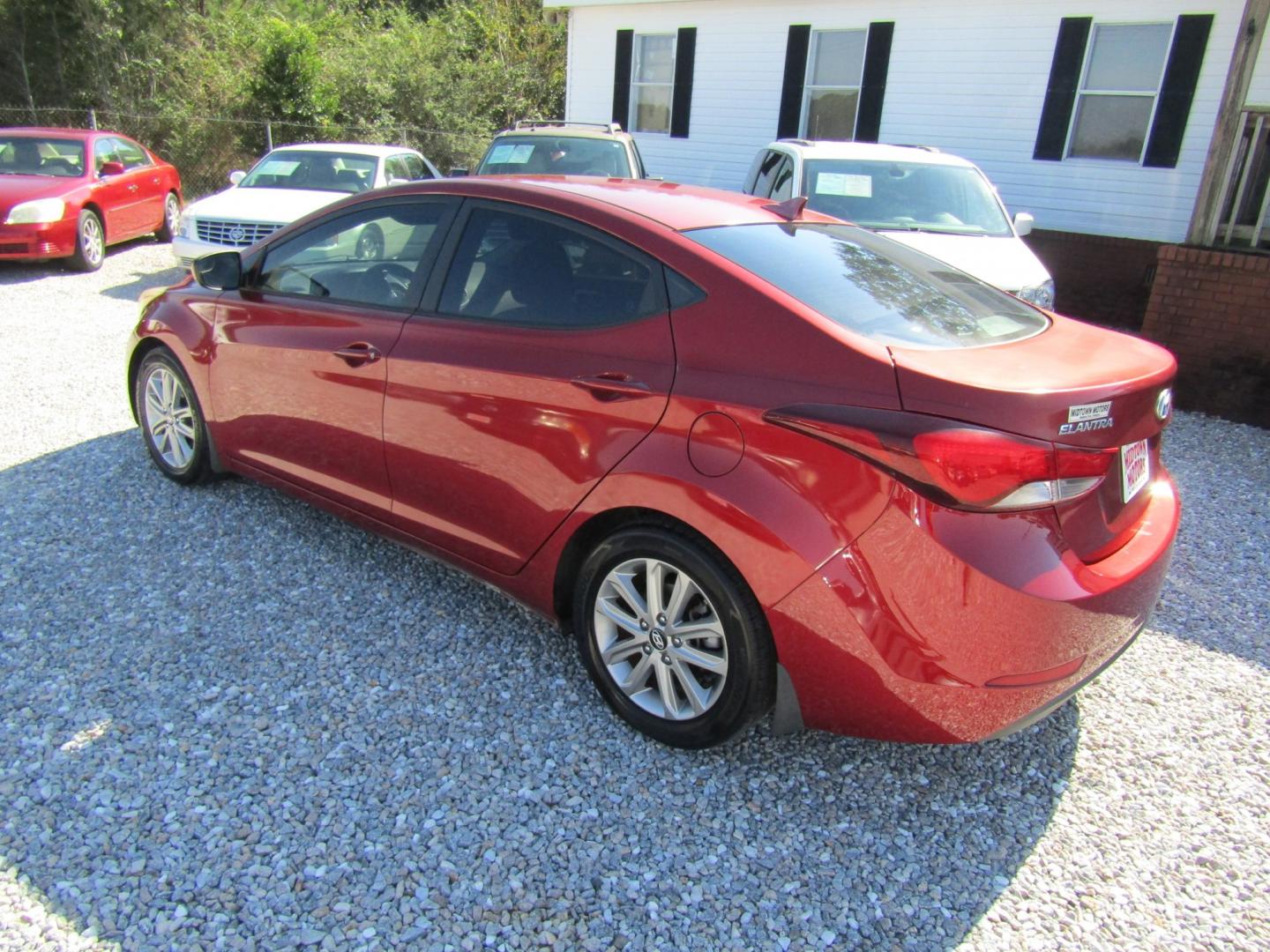 2016 Red /Gray Hyundai Elantra Limited (5NPDH4AE2GH) with an 1.8L L4 DOHC 16V engine, Automatic transmission, located at 15016 S Hwy 231, Midland City, AL, 36350, (334) 983-3001, 31.306210, -85.495277- Photo#5