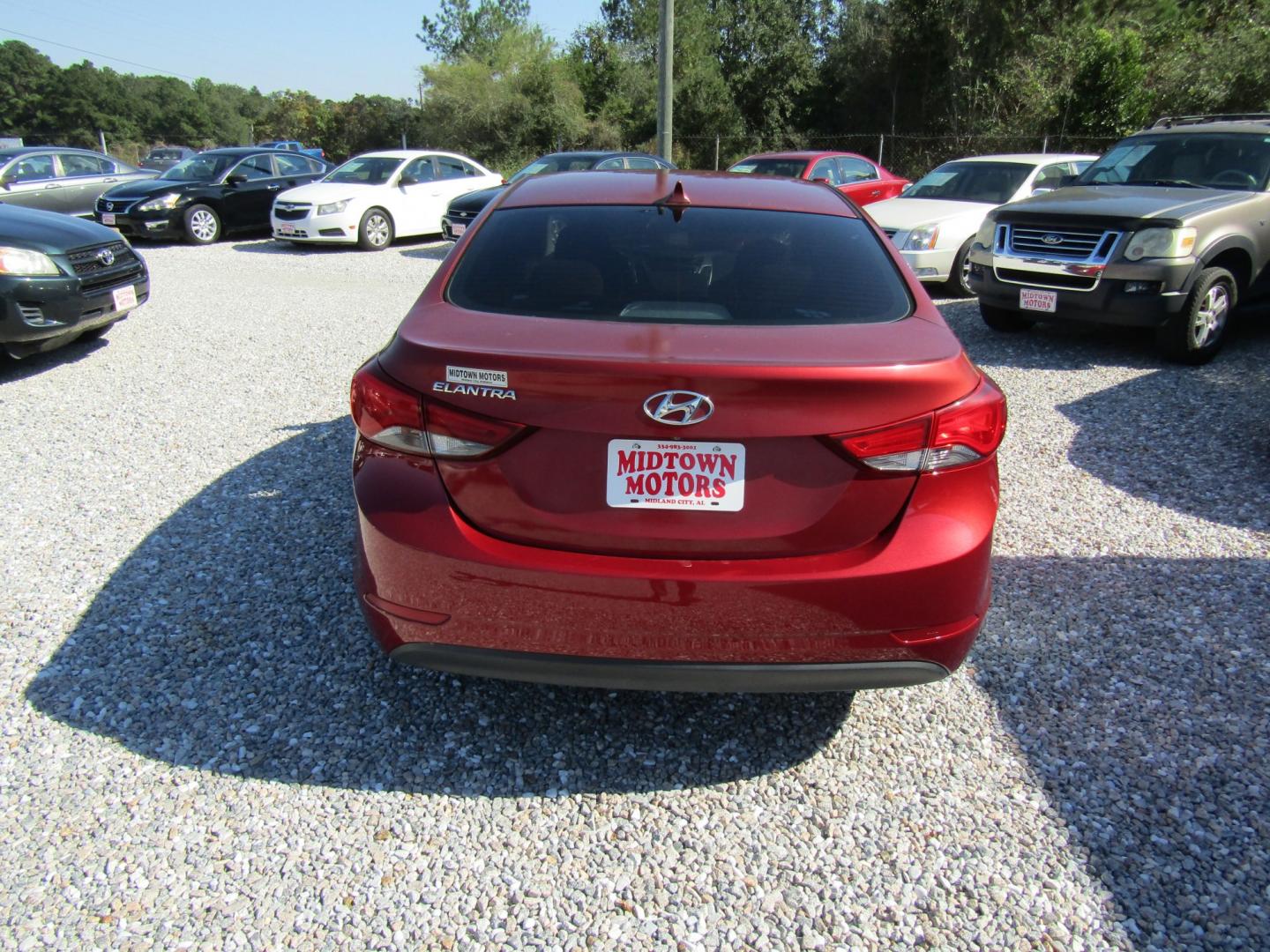 2016 Red /Gray Hyundai Elantra Limited (5NPDH4AE2GH) with an 1.8L L4 DOHC 16V engine, Automatic transmission, located at 15016 S Hwy 231, Midland City, AL, 36350, (334) 983-3001, 31.306210, -85.495277- Photo#6