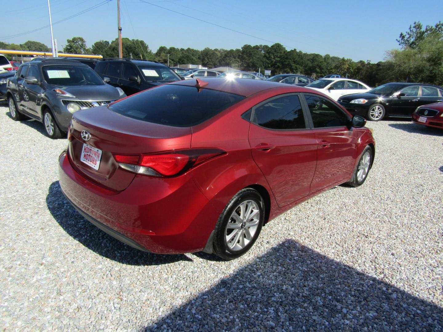 2016 Red /Gray Hyundai Elantra Limited (5NPDH4AE2GH) with an 1.8L L4 DOHC 16V engine, Automatic transmission, located at 15016 S Hwy 231, Midland City, AL, 36350, (334) 983-3001, 31.306210, -85.495277- Photo#7