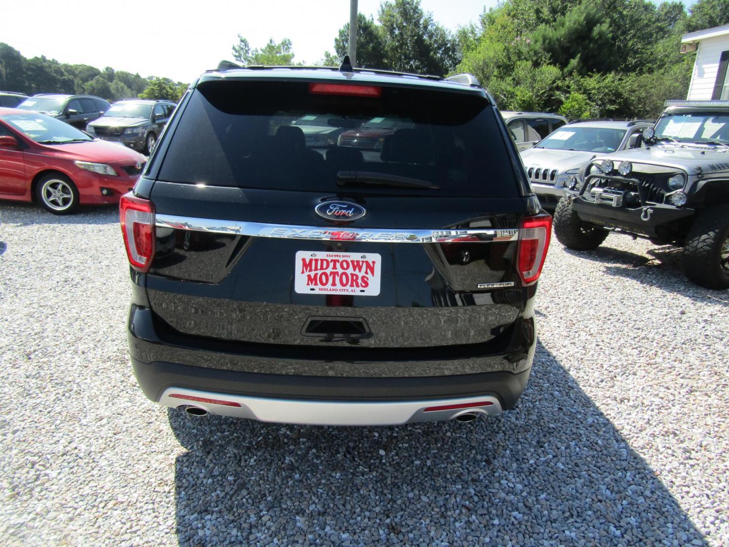 2016 Black /Tan Ford Explorer (1FM5K7D89GG) with an V6 engine, Automatic transmission, located at 15016 S Hwy 231, Midland City, AL, 36350, (334) 983-3001, 31.306210, -85.495277 - Photo#6