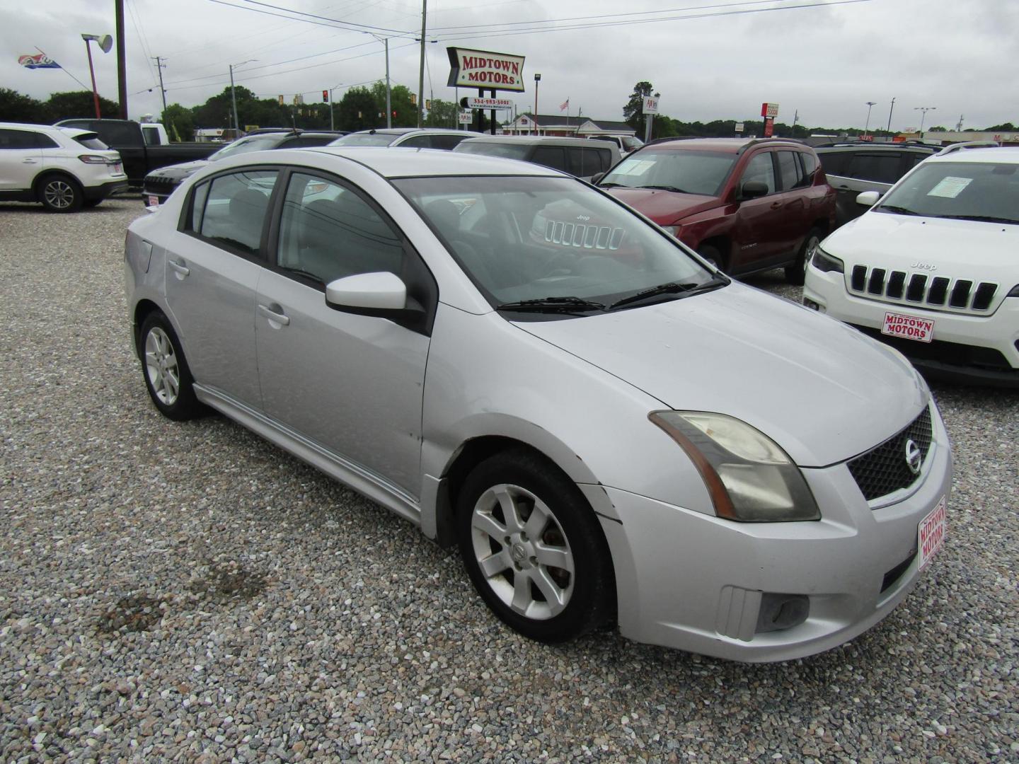 2012 Silver Nissan Sentra 2.0 (3N1AB6AP7CL) with an 2.0L L4 DOHC 16V engine, Automatic transmission, located at 15016 S Hwy 231, Midland City, AL, 36350, (334) 983-3001, 31.306210, -85.495277 - Photo#0