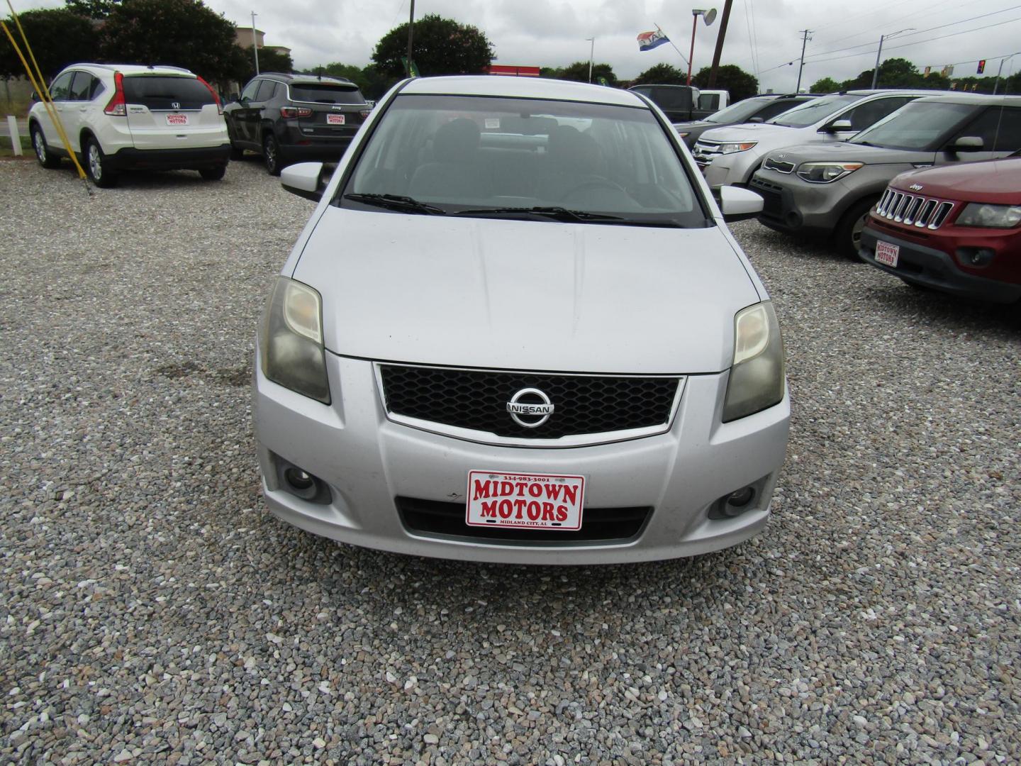 2012 Silver Nissan Sentra 2.0 (3N1AB6AP7CL) with an 2.0L L4 DOHC 16V engine, Automatic transmission, located at 15016 S Hwy 231, Midland City, AL, 36350, (334) 983-3001, 31.306210, -85.495277 - Photo#1