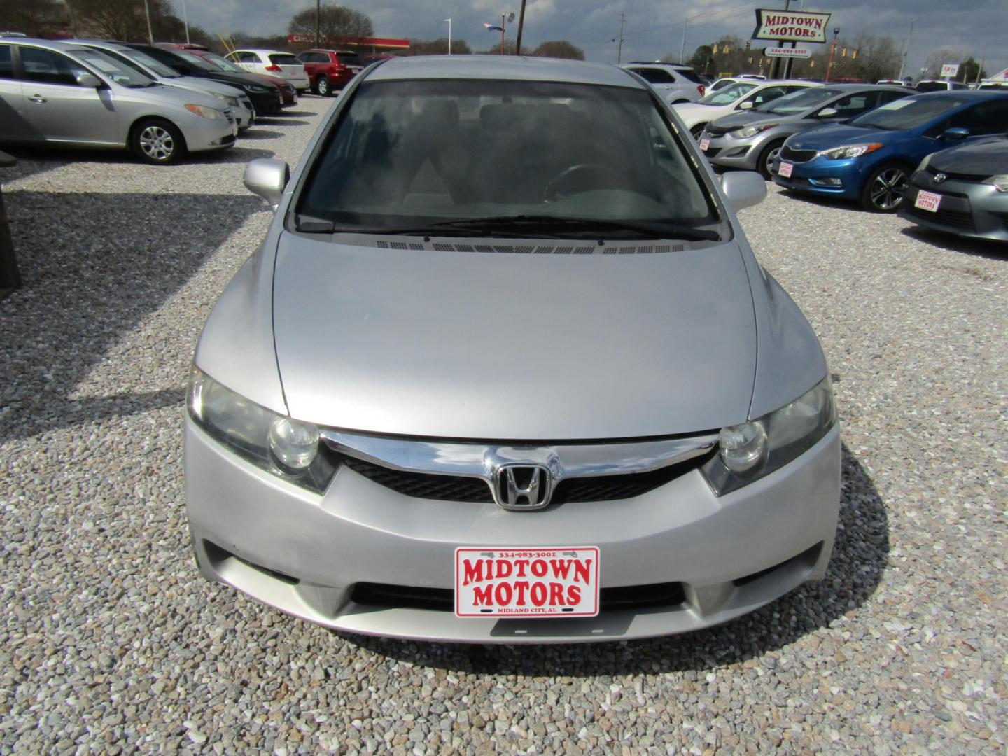 2010 Silver Honda Civic LX Sedan 5-Speed AT (19XFA1F51AE) with an 1.8L L4 SOHC 16V engine, Automatic transmission, located at 15016 S Hwy 231, Midland City, AL, 36350, (334) 983-3001, 31.306210, -85.495277 - Photo#0