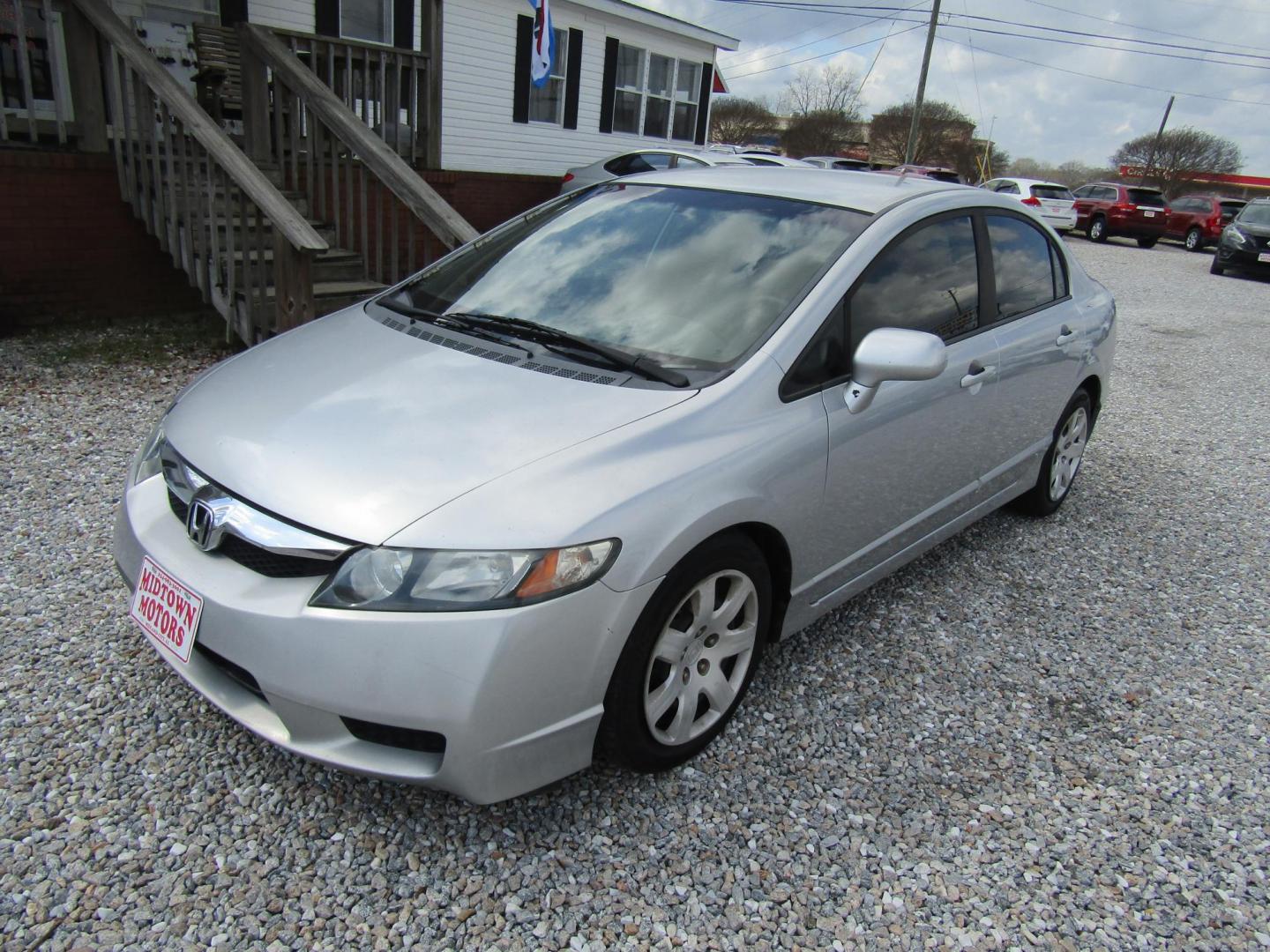 2010 Silver Honda Civic LX Sedan 5-Speed AT (19XFA1F51AE) with an 1.8L L4 SOHC 16V engine, Automatic transmission, located at 15016 S Hwy 231, Midland City, AL, 36350, (334) 983-3001, 31.306210, -85.495277 - Photo#1