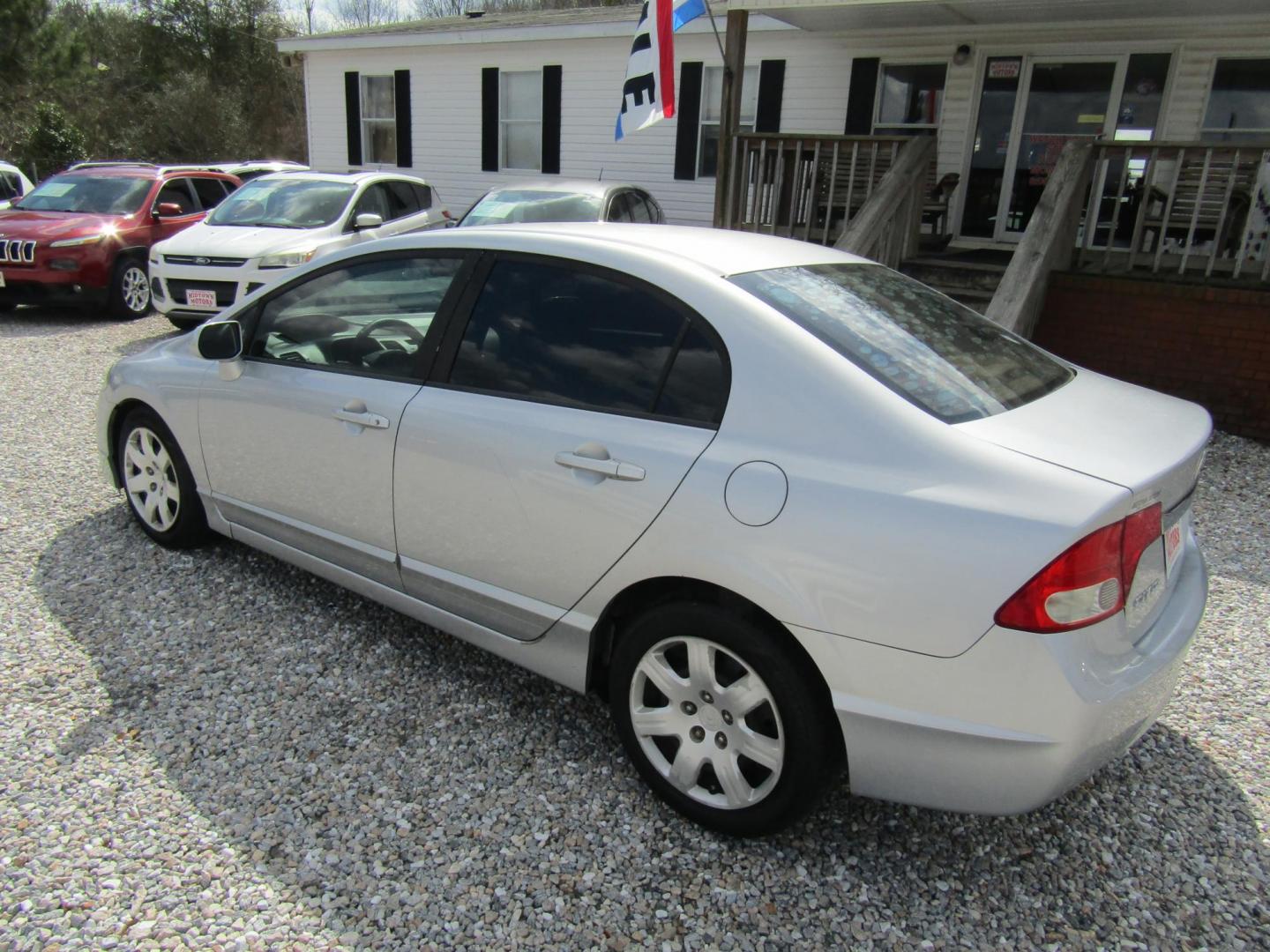 2010 Silver Honda Civic LX Sedan 5-Speed AT (19XFA1F51AE) with an 1.8L L4 SOHC 16V engine, Automatic transmission, located at 15016 S Hwy 231, Midland City, AL, 36350, (334) 983-3001, 31.306210, -85.495277 - Photo#4