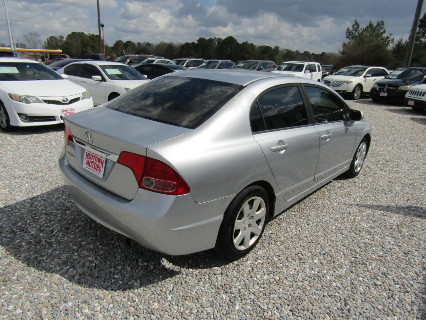 2010 Silver Honda Civic LX Sedan 5-Speed AT (19XFA1F51AE) with an 1.8L L4 SOHC 16V engine, Automatic transmission, located at 15016 S Hwy 231, Midland City, AL, 36350, (334) 983-3001, 31.306210, -85.495277 - Photo#6