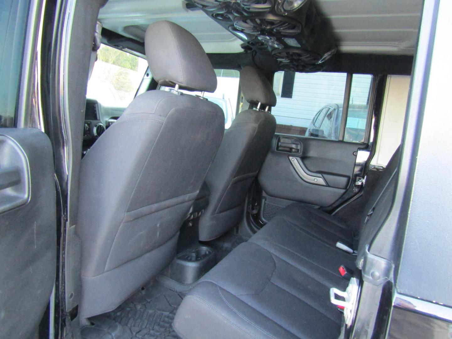 2016 Black Jeep Wrangler Unlimited Sport 4WD (1C4BJWDG9GL) with an 3.6L V6 DOHC 24V FFV engine, Automatic transmission, located at 15016 S Hwy 231, Midland City, AL, 36350, (334) 983-3001, 31.306210, -85.495277 - Photo#5