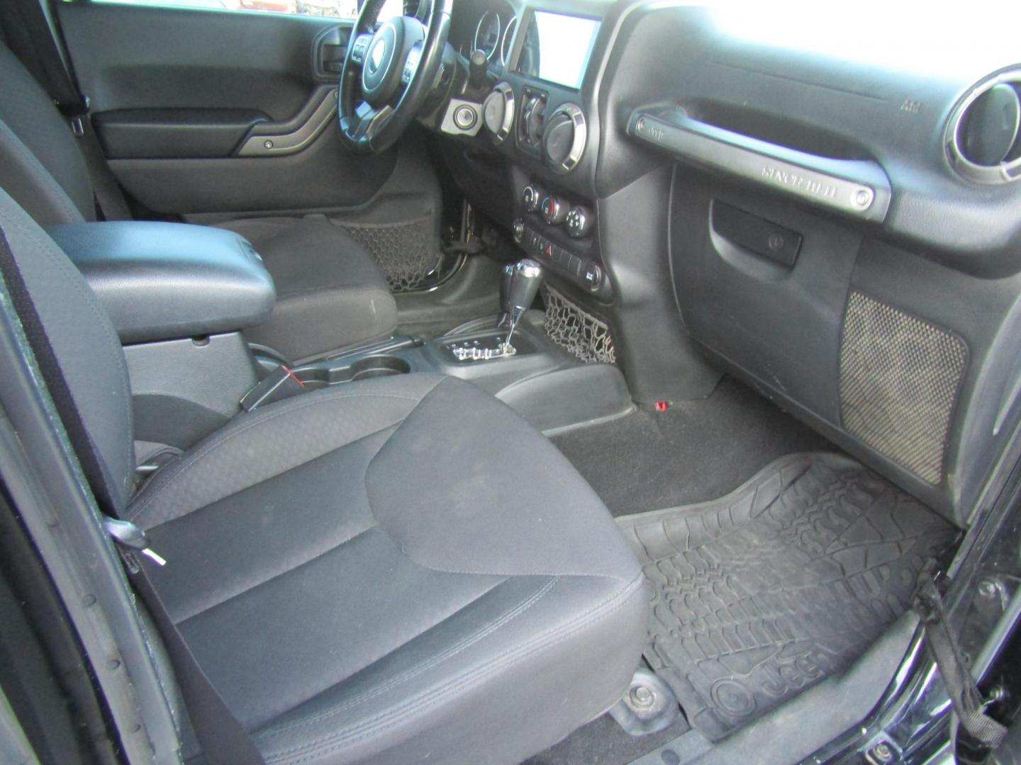 2016 Black Jeep Wrangler Unlimited Sport 4WD (1C4BJWDG9GL) with an 3.6L V6 DOHC 24V FFV engine, Automatic transmission, located at 15016 S Hwy 231, Midland City, AL, 36350, (334) 983-3001, 31.306210, -85.495277 - Photo#10