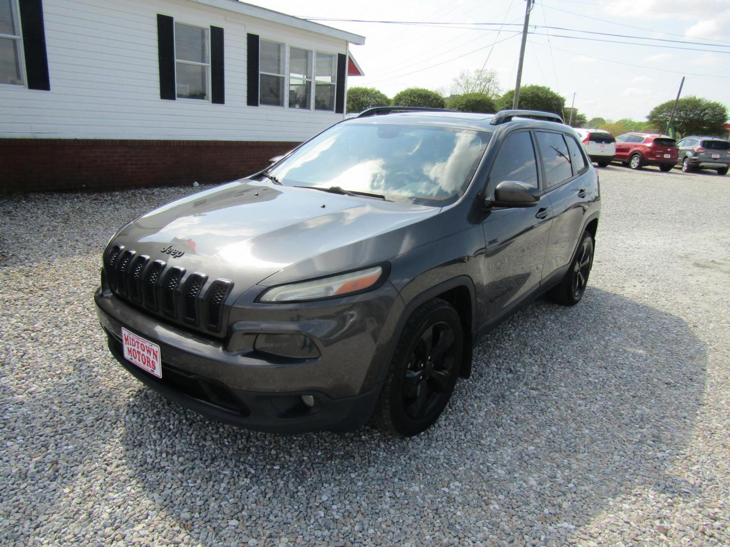2016 Black Jeep Cherokee Limited FWD (1C4PJLDSXGW) with an 3.2L V6 DOHC 24V engine, Automatic transmission, located at 15016 S Hwy 231, Midland City, AL, 36350, (334) 983-3001, 31.306210, -85.495277 - Photo#2