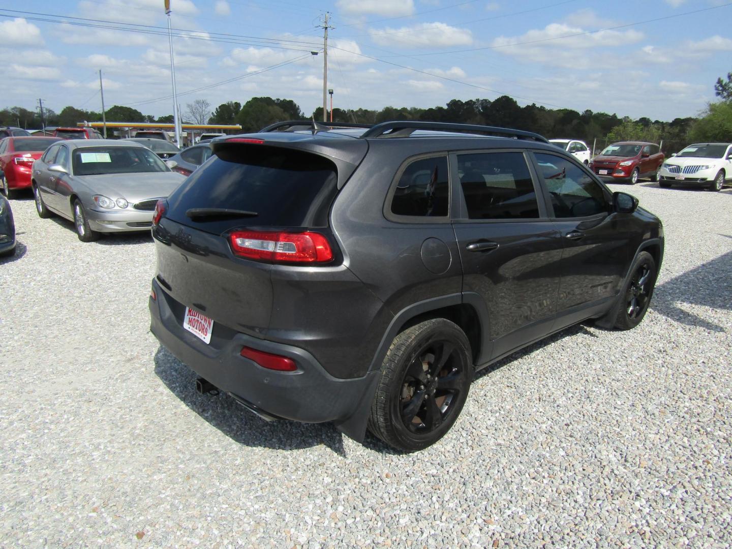 2016 Black Jeep Cherokee Limited FWD (1C4PJLDSXGW) with an 3.2L V6 DOHC 24V engine, Automatic transmission, located at 15016 S Hwy 231, Midland City, AL, 36350, (334) 983-3001, 31.306210, -85.495277 - Photo#7
