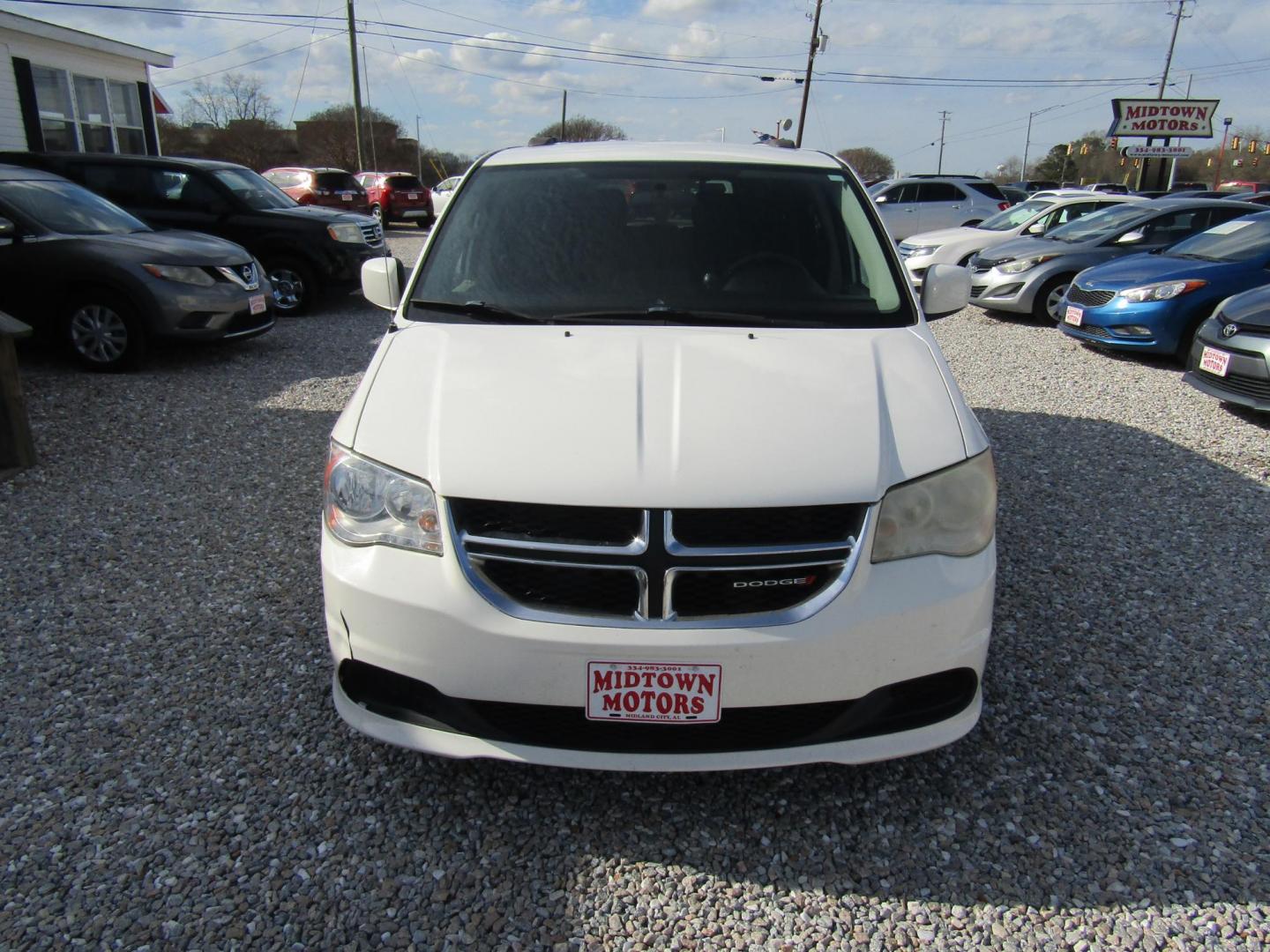 2013 White Dodge Grand Caravan SXT (2C4RDGCG0DR) with an 3.6L V6 DOHC 24V engine, Automatic transmission, located at 15016 S Hwy 231, Midland City, AL, 36350, (334) 983-3001, 31.306210, -85.495277 - Photo#1