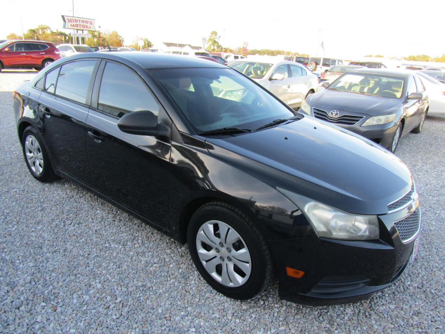 2013 Black Chevrolet Cruze LS Auto (1G1PA5SHXD7) with an 1.8L L4 DOHC 16V FFV engine, Automatic transmission, located at 15016 S Hwy 231, Midland City, AL, 36350, (334) 983-3001, 31.306210, -85.495277 - Photo#0