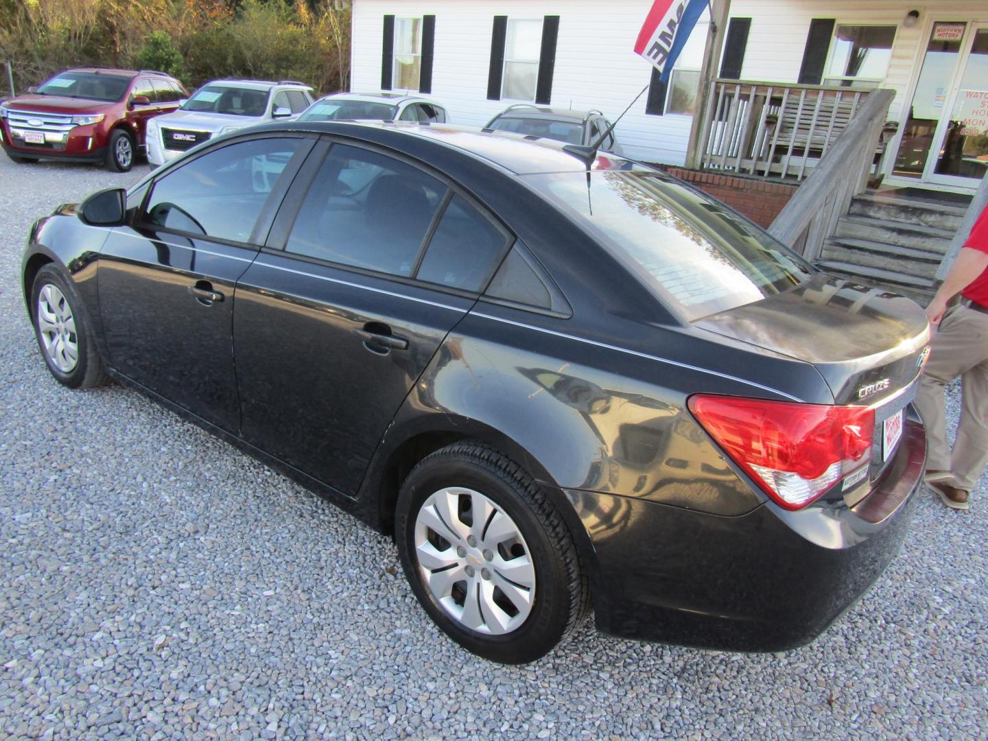 2013 Black Chevrolet Cruze LS Auto (1G1PA5SHXD7) with an 1.8L L4 DOHC 16V FFV engine, Automatic transmission, located at 15016 S Hwy 231, Midland City, AL, 36350, (334) 983-3001, 31.306210, -85.495277 - Photo#4