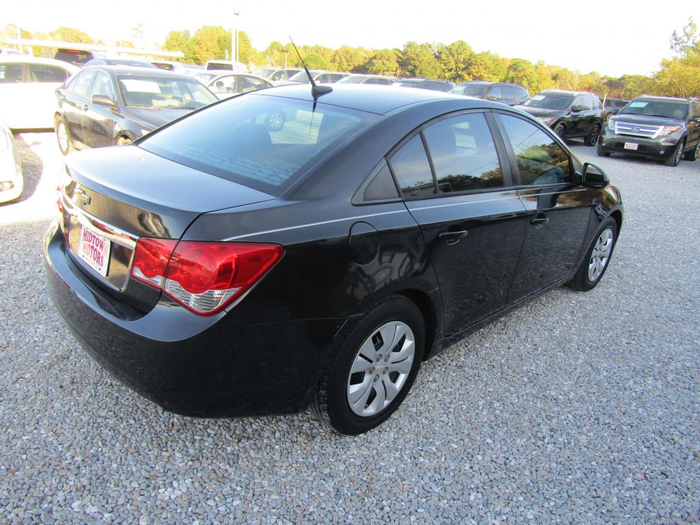 2013 Black Chevrolet Cruze LS Auto (1G1PA5SHXD7) with an 1.8L L4 DOHC 16V FFV engine, Automatic transmission, located at 15016 S Hwy 231, Midland City, AL, 36350, (334) 983-3001, 31.306210, -85.495277 - Photo#6