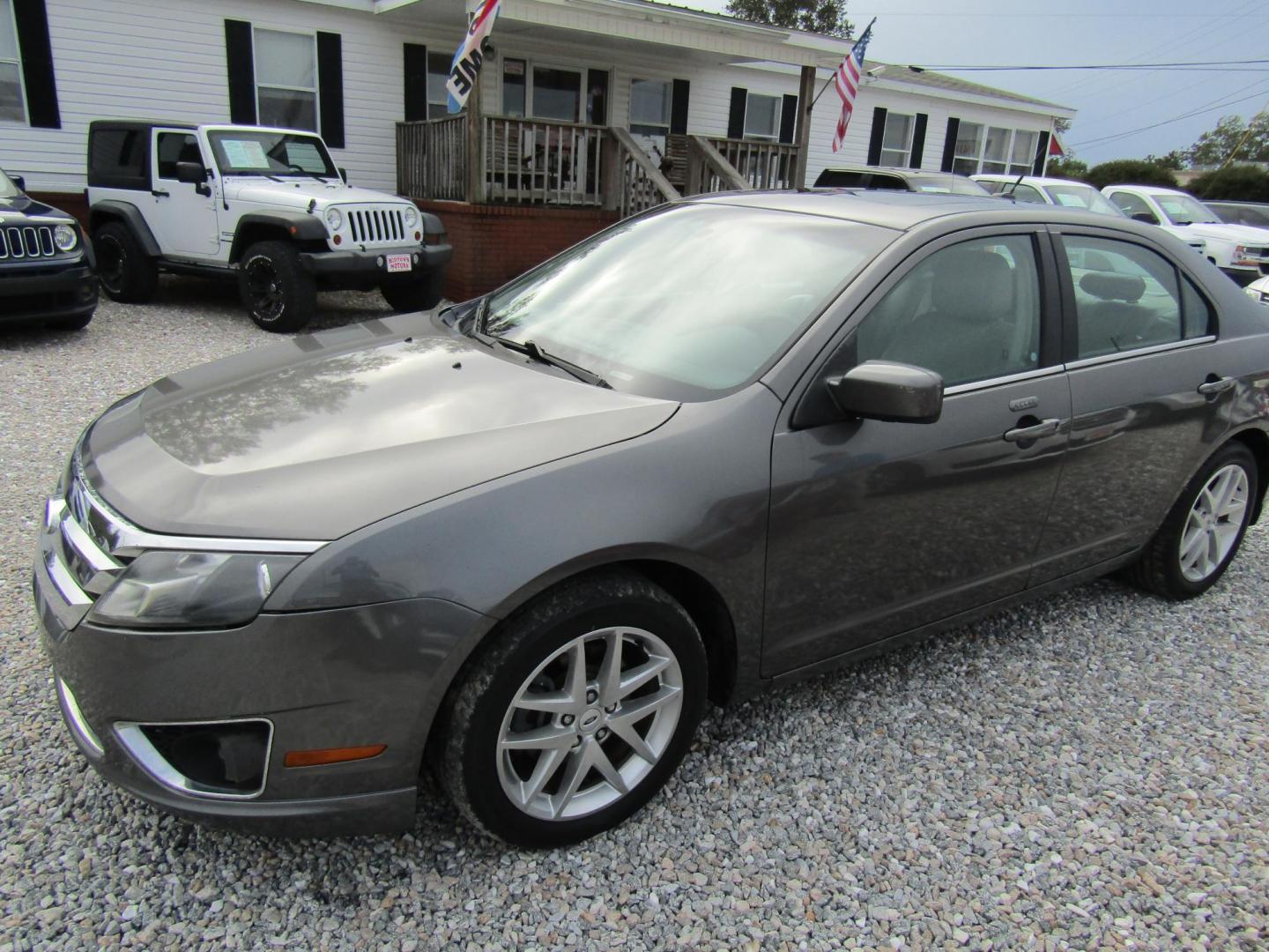 2012 Gray Ford Fusion SEL (3FAHP0JG0CR) with an 3.0L V6 DOHC 24V engine, Automatic transmission, located at 15016 S Hwy 231, Midland City, AL, 36350, (334) 983-3001, 31.306210, -85.495277 - Photo#2