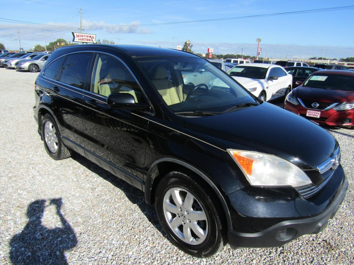 2008 Black Honda CR-V EX-L 2WD AT (JHLRE38778C) with an 2.4L L4 DOHC 16V engine, Automatic transmission, located at 15016 S Hwy 231, Midland City, AL, 36350, (334) 983-3001, 31.306210, -85.495277 - Photo#0