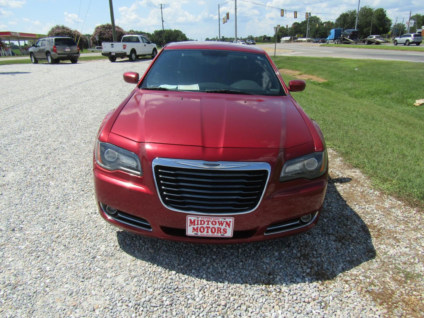 2012 Red Chrysler 300 S V6 RWD (2C3CCABG2CH) with an 3.6L V6 DOHC 24V engine, Automatic transmission, located at 15016 S Hwy 231, Midland City, AL, 36350, (334) 983-3001, 31.306210, -85.495277- Photo#1