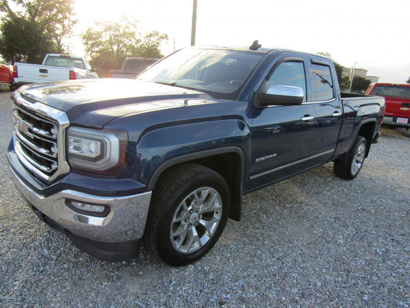 2016 Blue GMC Sierra 1500 SLT Double Cab 2WD (1GTR1NEC9GZ) with an 5.3L V8 OHV 16V engine, Automatic transmission, located at 15016 S Hwy 231, Midland City, AL, 36350, (334) 983-3001, 31.306210, -85.495277 - Photo#2