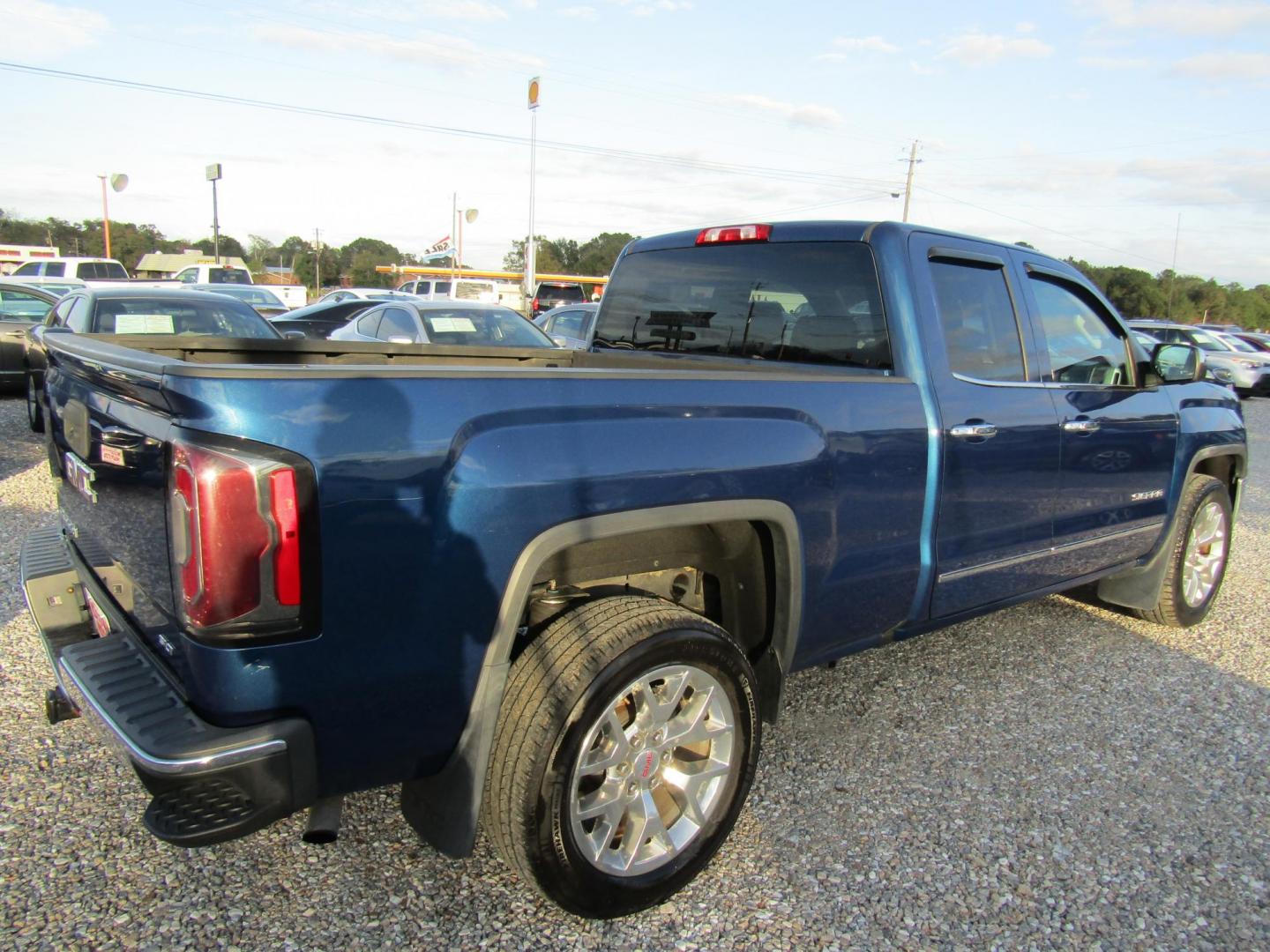 2016 Blue GMC Sierra 1500 SLT Double Cab 2WD (1GTR1NEC9GZ) with an 5.3L V8 OHV 16V engine, Automatic transmission, located at 15016 S Hwy 231, Midland City, AL, 36350, (334) 983-3001, 31.306210, -85.495277 - Photo#7