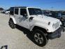 2016 White Jeep Wrangler Unlimited Sahara 4WD (1C4BJWEG9GL) with an 3.6L V6 DOHC 24V FFV engine, Automatic transmission, located at 15016 S Hwy 231, Midland City, AL, 36350, (334) 983-3001, 31.306210, -85.495277 - Photo#0