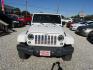 2016 White Jeep Wrangler Unlimited Sahara 4WD (1C4BJWEG9GL) with an 3.6L V6 DOHC 24V FFV engine, Automatic transmission, located at 15016 S Hwy 231, Midland City, AL, 36350, (334) 983-3001, 31.306210, -85.495277 - Photo#1