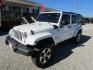 2016 White Jeep Wrangler Unlimited Sahara 4WD (1C4BJWEG9GL) with an 3.6L V6 DOHC 24V FFV engine, Automatic transmission, located at 15016 S Hwy 231, Midland City, AL, 36350, (334) 983-3001, 31.306210, -85.495277 - Photo#2
