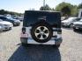 2016 White Jeep Wrangler Unlimited Sahara 4WD (1C4BJWEG9GL) with an 3.6L V6 DOHC 24V FFV engine, Automatic transmission, located at 15016 S Hwy 231, Midland City, AL, 36350, (334) 983-3001, 31.306210, -85.495277 - Photo#4