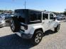 2016 White Jeep Wrangler Unlimited Sahara 4WD (1C4BJWEG9GL) with an 3.6L V6 DOHC 24V FFV engine, Automatic transmission, located at 15016 S Hwy 231, Midland City, AL, 36350, (334) 983-3001, 31.306210, -85.495277 - Photo#5