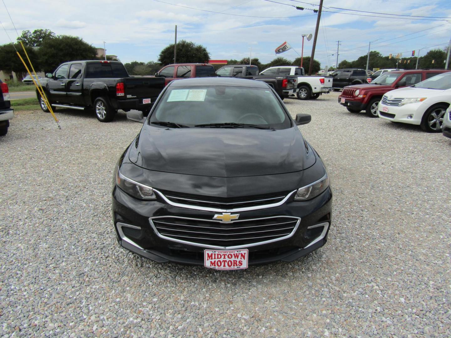 2017 Black Chevrolet Malibu LS (1G1ZB5ST6HF) with an 1.5L L4 DOHC 16V engine, Automatic transmission, located at 15016 S Hwy 231, Midland City, AL, 36350, (334) 983-3001, 31.306210, -85.495277 - Photo#1