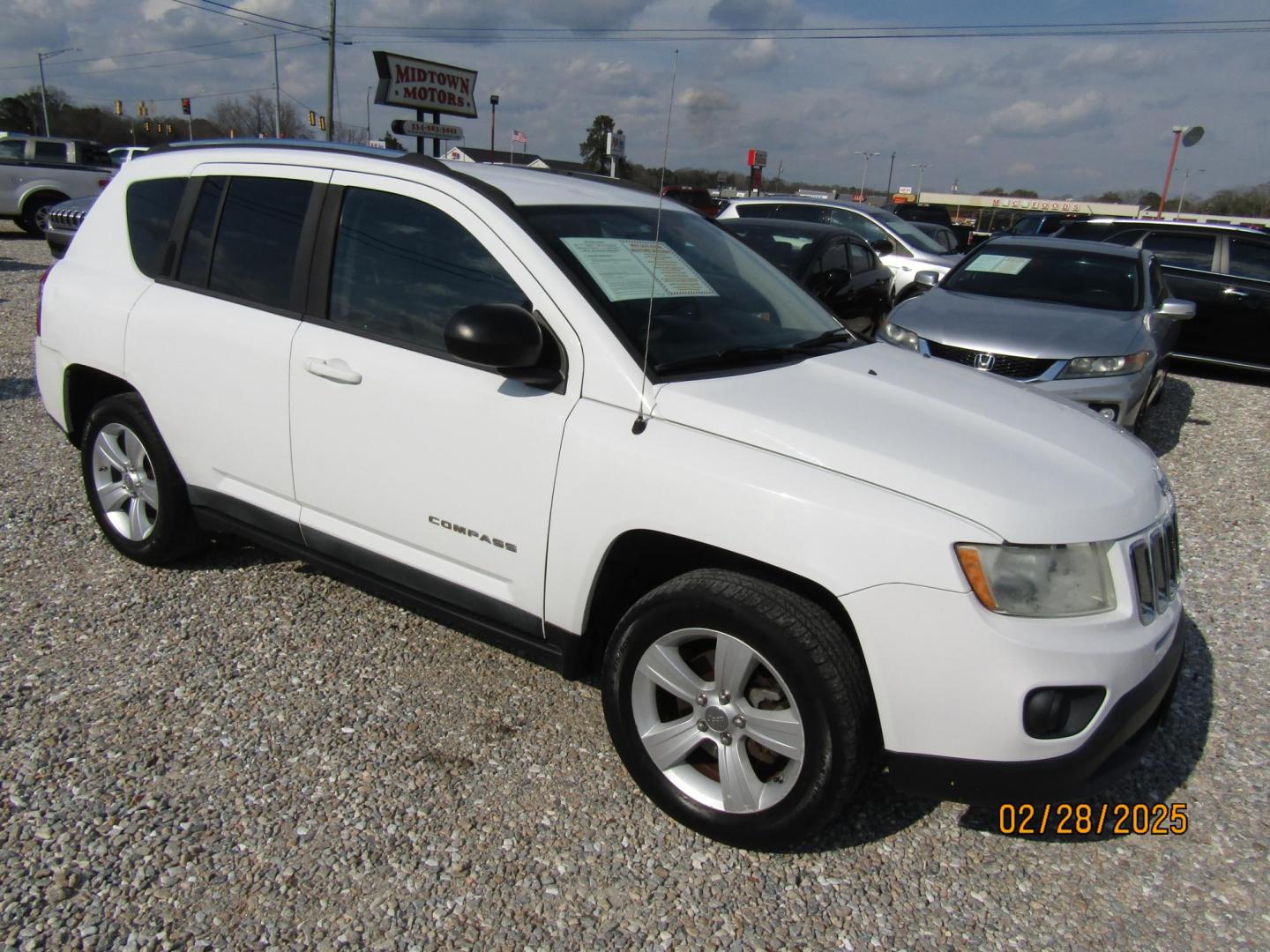 2011 WHITE Jeep Compass Sport FWD (1J4NT1FB5BD) with an 2.4L L4 DOHC 16V engine, Automatic transmission, located at 15016 S Hwy 231, Midland City, AL, 36350, (334) 983-3001, 31.306210, -85.495277 - Photo#0