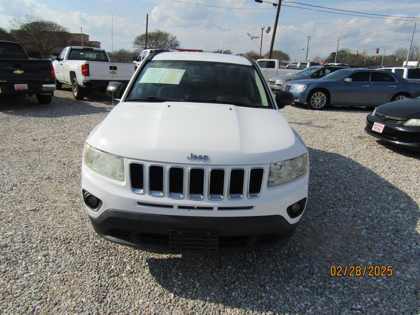 2011 WHITE Jeep Compass Sport FWD (1J4NT1FB5BD) with an 2.4L L4 DOHC 16V engine, Automatic transmission, located at 15016 S Hwy 231, Midland City, AL, 36350, (334) 983-3001, 31.306210, -85.495277 - Photo#2