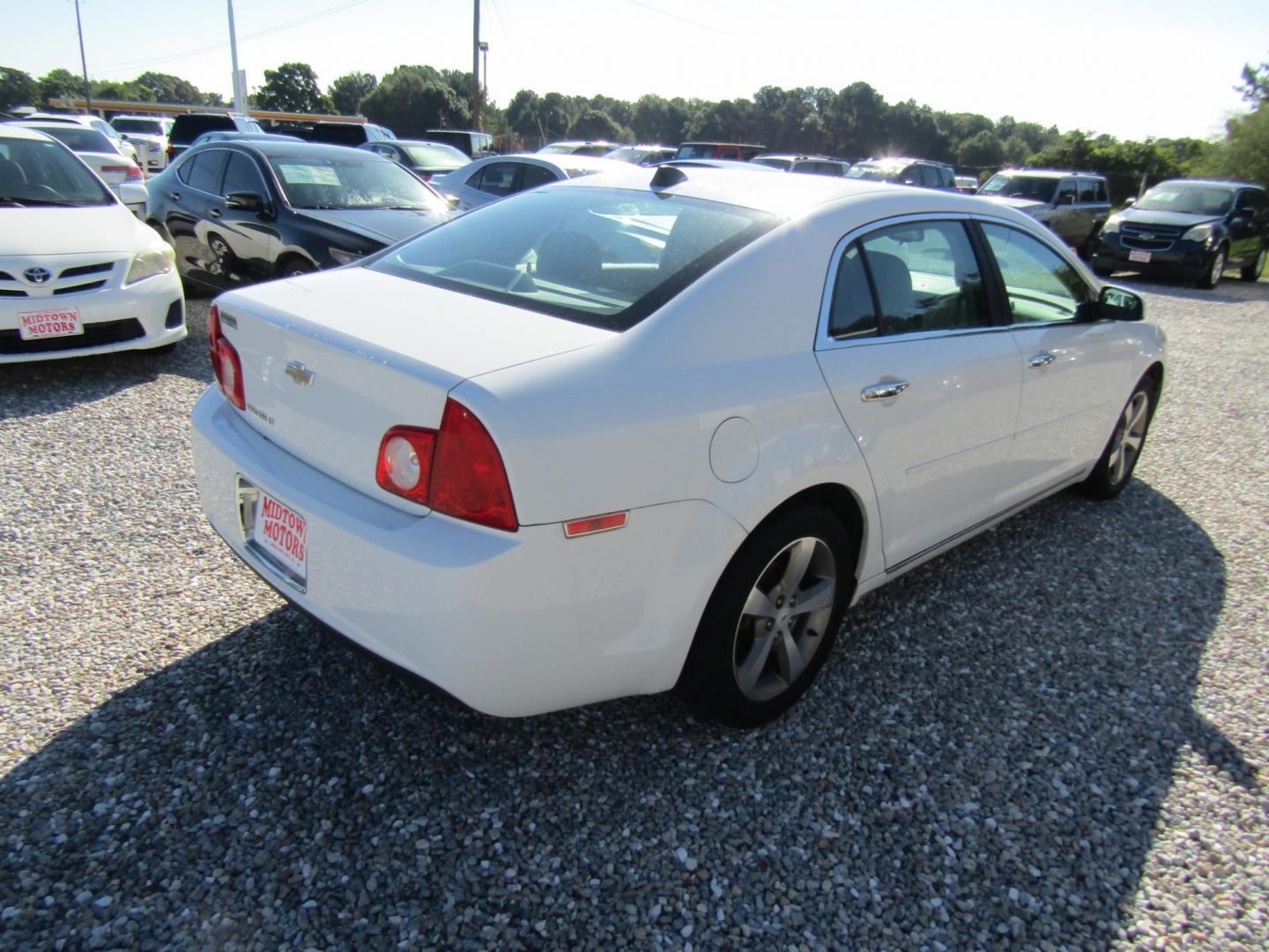 2012 WHITE Chevrolet Malibu 1LT (1G1ZC5E01CF) with an 2.4L L4 DOHC 16V engine, Automatic transmission, located at 15016 S Hwy 231, Midland City, AL, 36350, (334) 983-3001, 31.306210, -85.495277- Photo#7