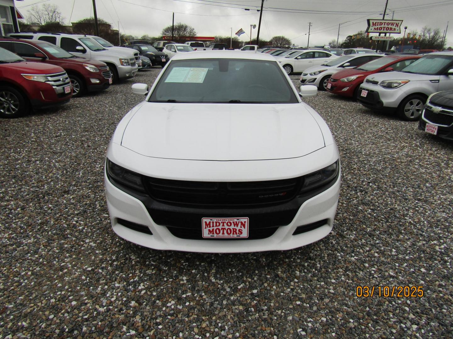 2016 White Dodge Charger SXT (2C3CDXHG2GH) with an 3.6L V6 DOHC 24V engine, Automatic transmission, located at 15016 S Hwy 231, Midland City, AL, 36350, (334) 983-3001, 31.306210, -85.495277 - Photo#1