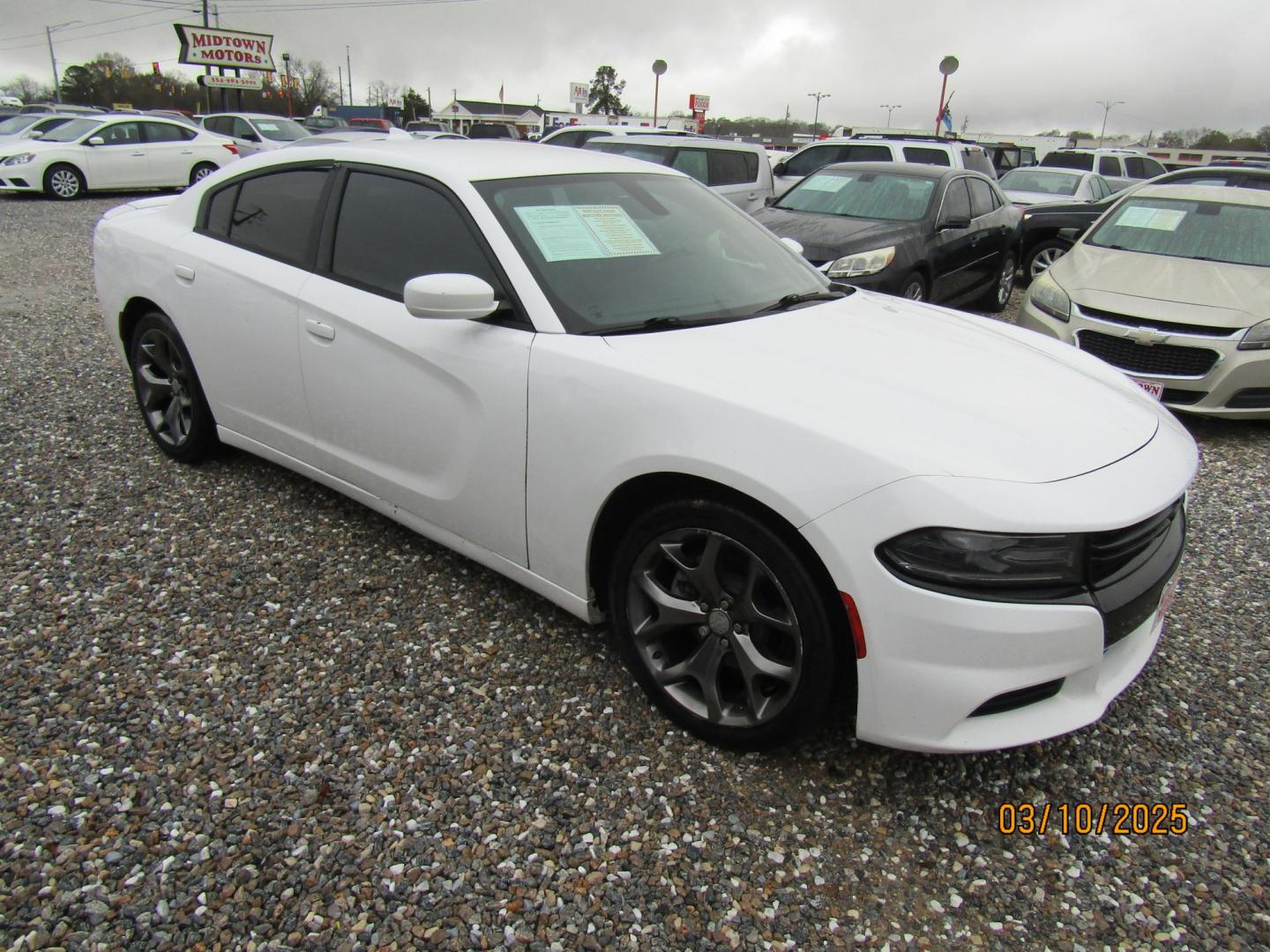2016 White Dodge Charger SXT (2C3CDXHG2GH) with an 3.6L V6 DOHC 24V engine, Automatic transmission, located at 15016 S Hwy 231, Midland City, AL, 36350, (334) 983-3001, 31.306210, -85.495277 - Photo#0