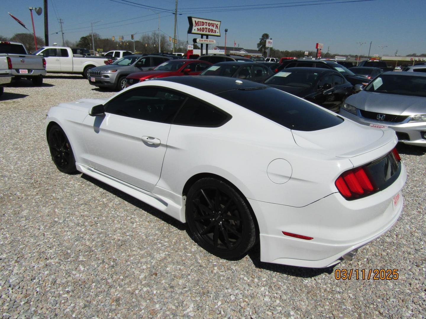 2015 White Ford Mustang EcoBoost Coupe (1FA6P8TH6F5) with an 2.3L L4 DOHC 16V engine, Automatic transmission, located at 15016 S Hwy 231, Midland City, AL, 36350, (334) 983-3001, 31.306210, -85.495277 - Photo#5