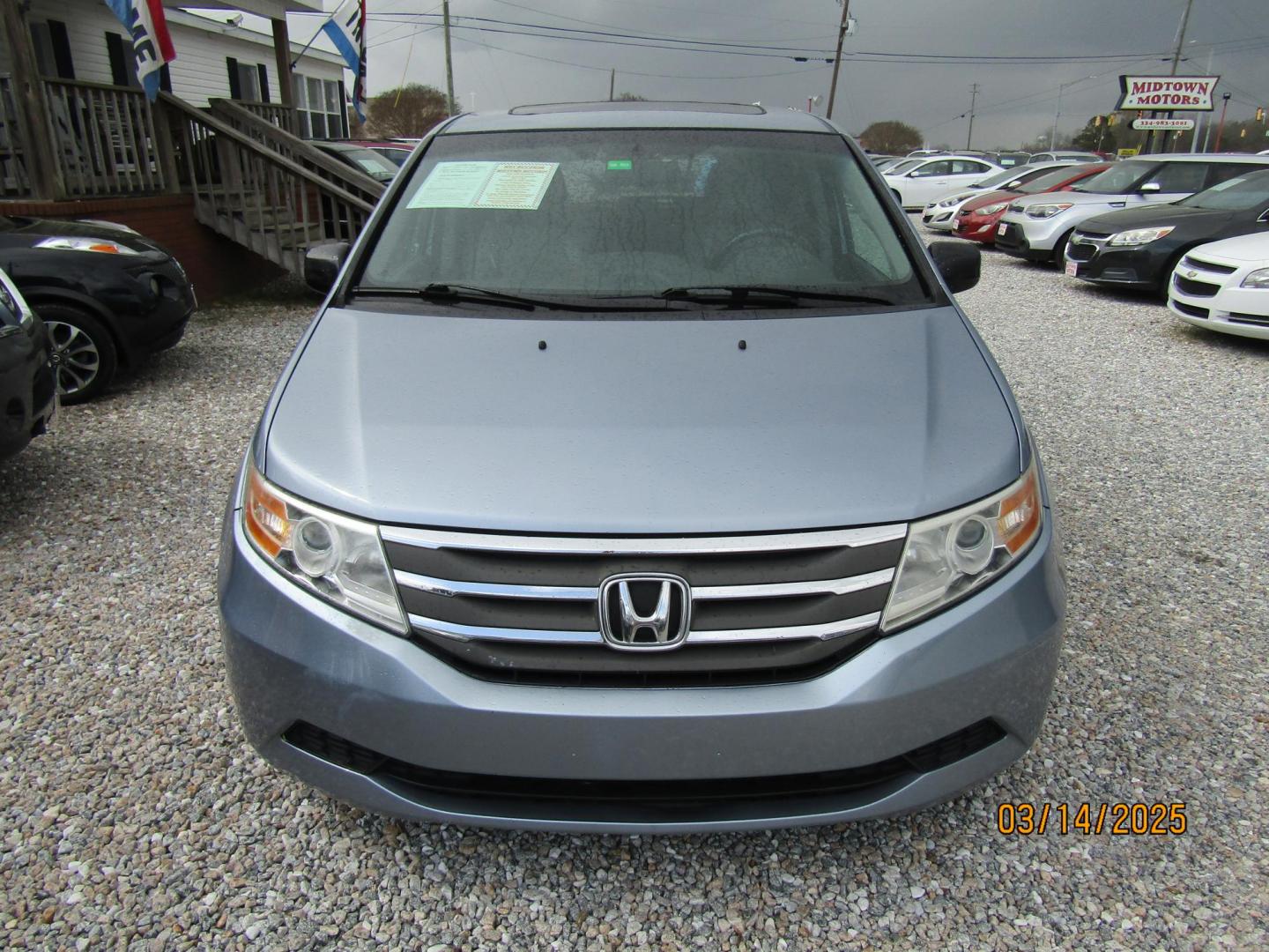 2012 Blue Honda Odyssey EX-L (5FNRL5H67CB) with an 3.5L V6 SOHC 24V engine, Automatic transmission, located at 15016 S Hwy 231, Midland City, AL, 36350, (334) 983-3001, 31.306210, -85.495277 - Photo#1