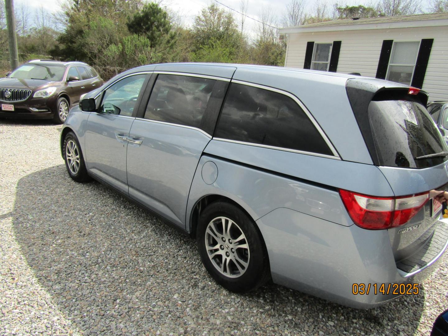 2012 Blue Honda Odyssey EX-L (5FNRL5H67CB) with an 3.5L V6 SOHC 24V engine, Automatic transmission, located at 15016 S Hwy 231, Midland City, AL, 36350, (334) 983-3001, 31.306210, -85.495277 - Photo#5