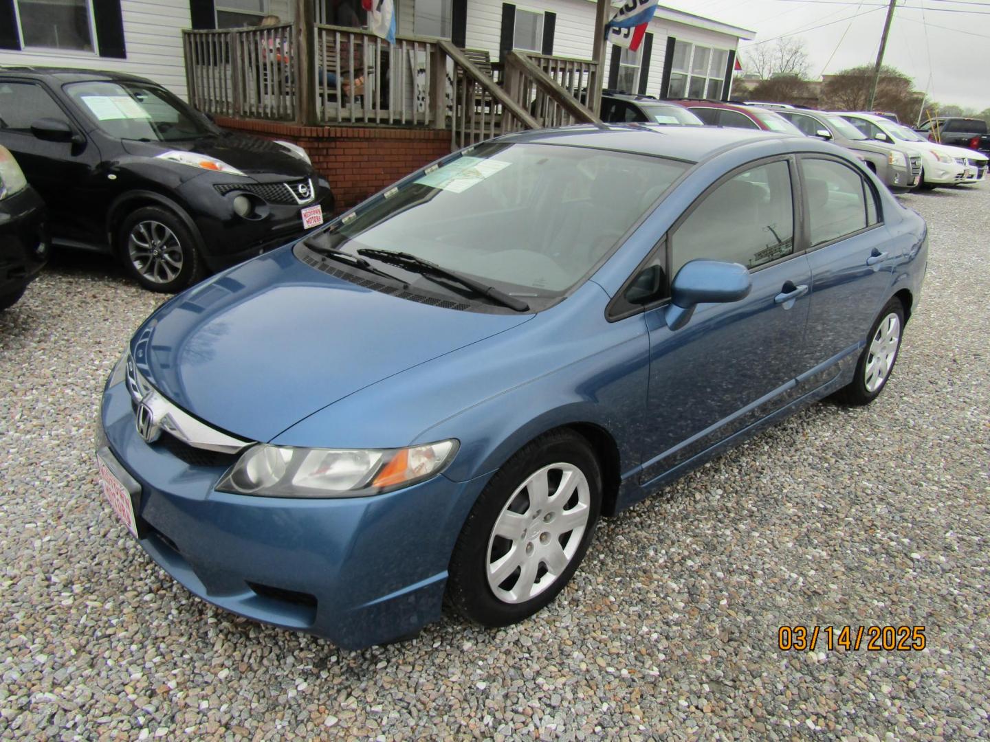 2010 Blue Honda Civic LX Sedan 5-Speed AT (2HGFA1F55AH) with an 1.8L L4 SOHC 16V engine, Automatic transmission, located at 15016 S Hwy 231, Midland City, AL, 36350, (334) 983-3001, 31.306210, -85.495277 - Photo#2