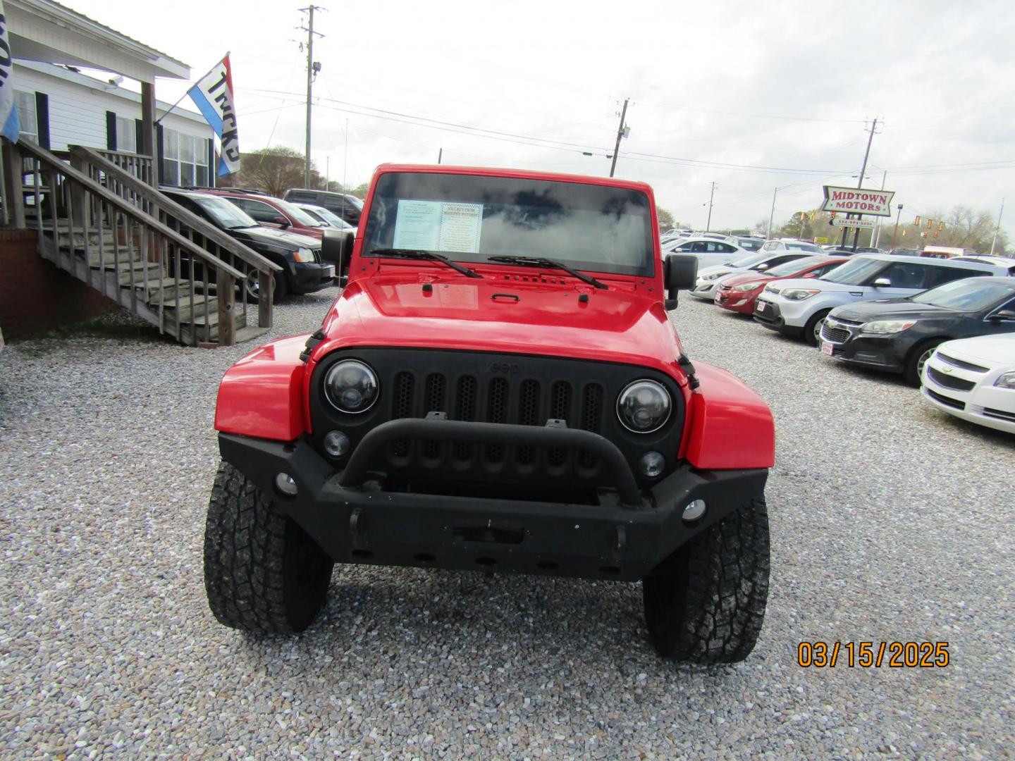 2015 Red Jeep Wrangler Unlimited Sahara 4WD (1C4BJWEG4FL) with an 3.6L V6 DOHC 24V FFV engine, Automatic transmission, located at 15016 S Hwy 231, Midland City, AL, 36350, (334) 983-3001, 31.306210, -85.495277 - Photo#1