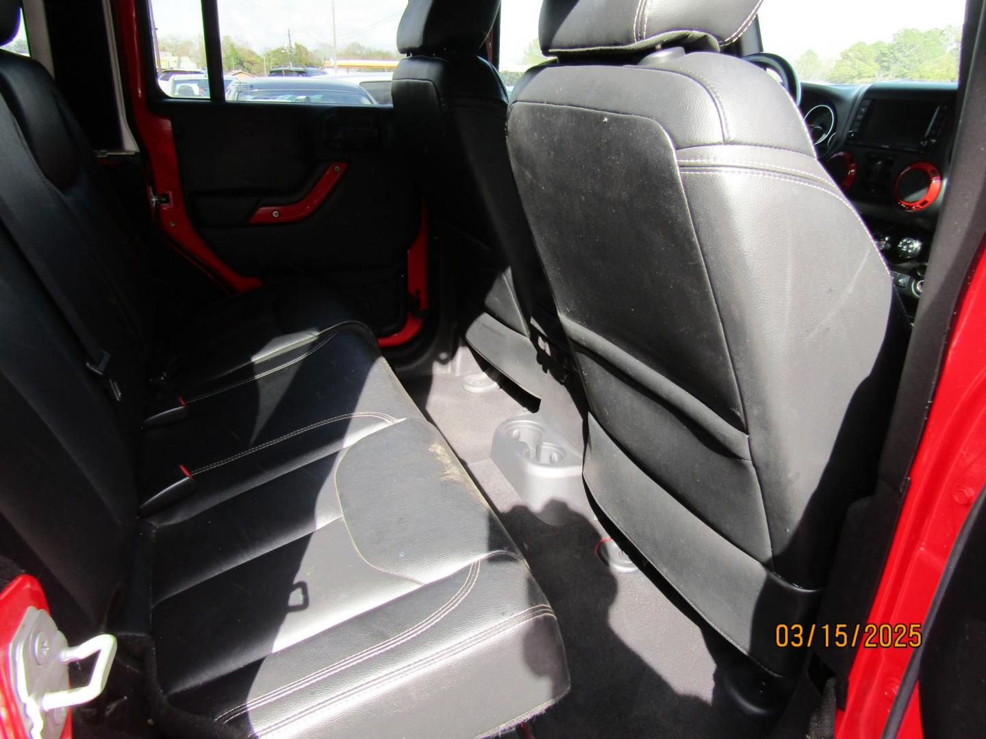 2015 Red Jeep Wrangler Unlimited Sahara 4WD (1C4BJWEG4FL) with an 3.6L V6 DOHC 24V FFV engine, Automatic transmission, located at 15016 S Hwy 231, Midland City, AL, 36350, (334) 983-3001, 31.306210, -85.495277 - Photo#8