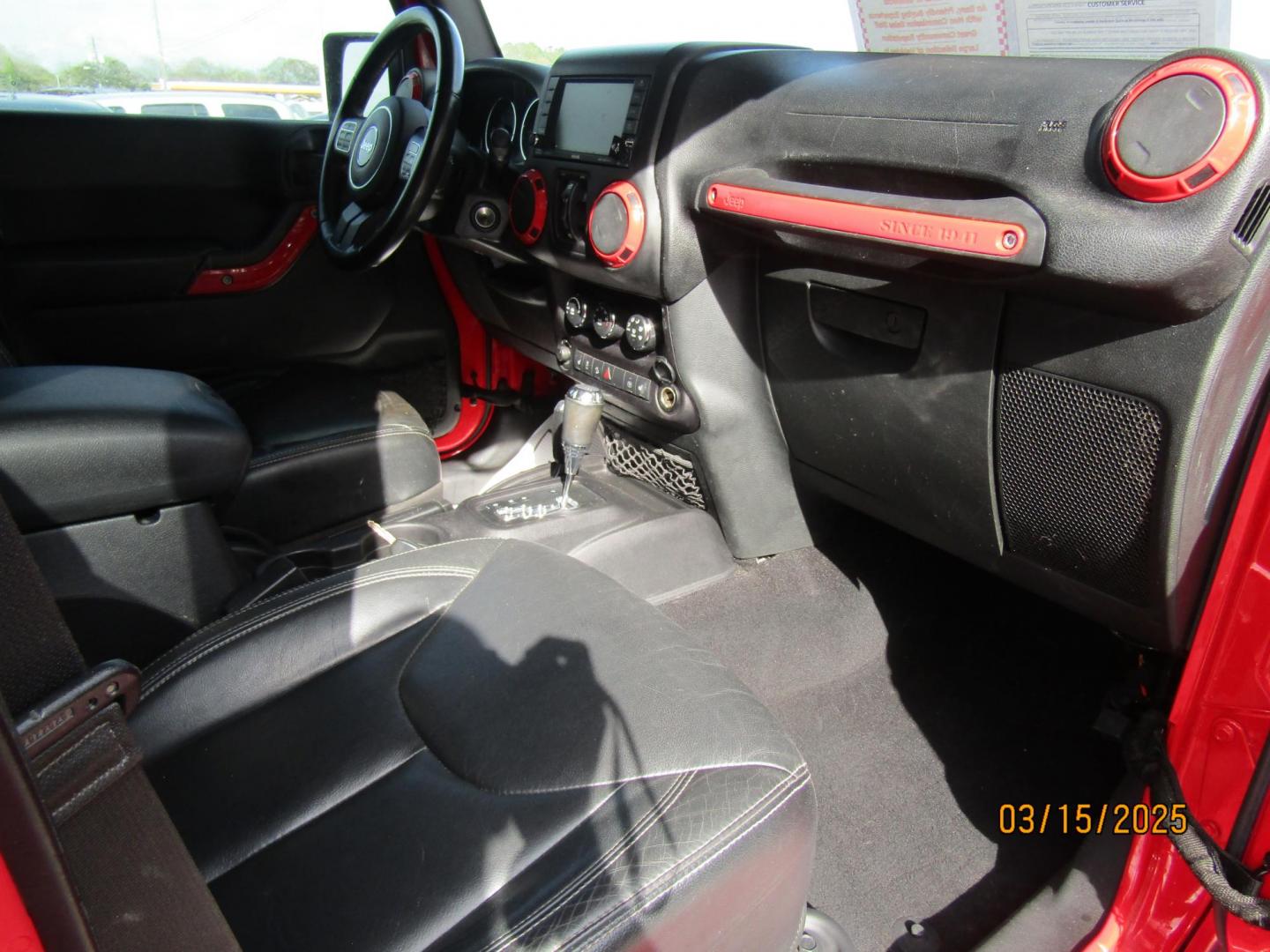2015 Red Jeep Wrangler Unlimited Sahara 4WD (1C4BJWEG4FL) with an 3.6L V6 DOHC 24V FFV engine, Automatic transmission, located at 15016 S Hwy 231, Midland City, AL, 36350, (334) 983-3001, 31.306210, -85.495277 - Photo#9