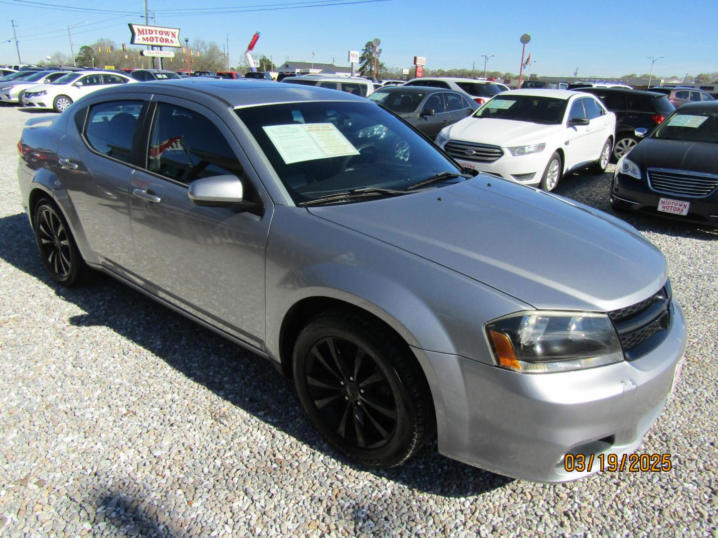 2014 Silver Dodge Avenger SXT (1C3CDZCG3EN) with an 3.6L V6 DOHC 24V FFV engine, Automatic transmission, located at 15016 S Hwy 231, Midland City, AL, 36350, (334) 983-3001, 31.306210, -85.495277 - Photo#0