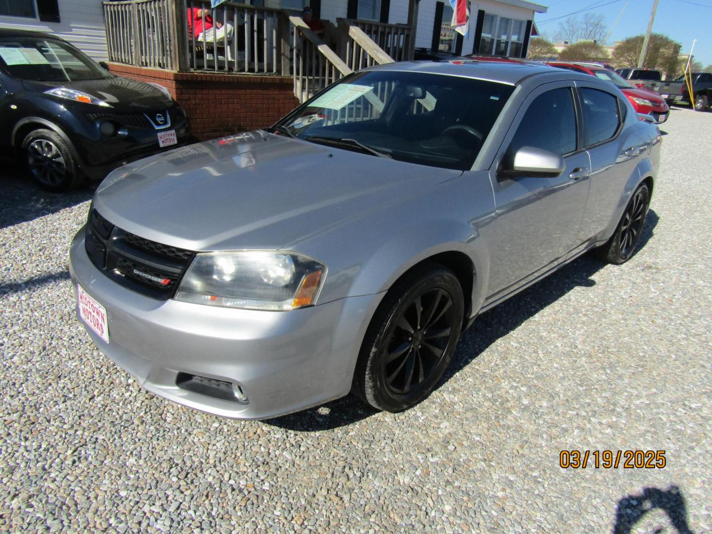 2014 Silver Dodge Avenger SXT (1C3CDZCG3EN) with an 3.6L V6 DOHC 24V FFV engine, Automatic transmission, located at 15016 S Hwy 231, Midland City, AL, 36350, (334) 983-3001, 31.306210, -85.495277 - Photo#1