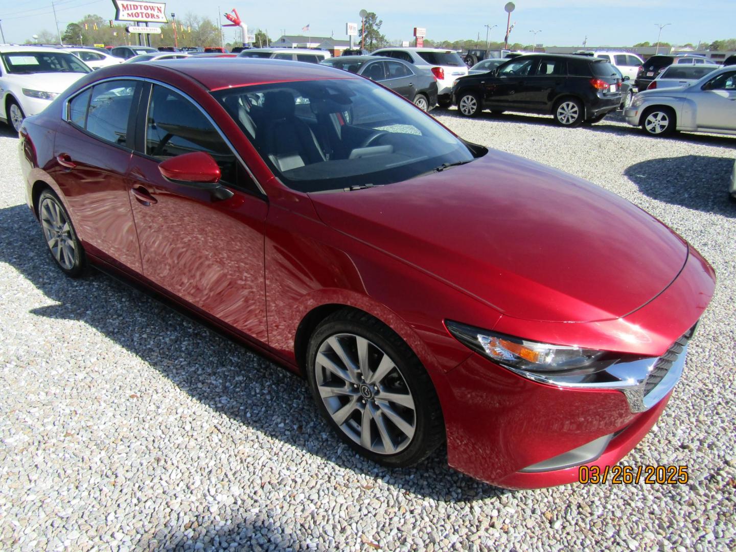 2021 Red Mazda MAZDA3 Select (3MZBPABL8MM) with an 2.5L L4 DOHC 16V engine, Automatic transmission, located at 15016 S Hwy 231, Midland City, AL, 36350, (334) 983-3001, 31.306210, -85.495277 - Photo#0