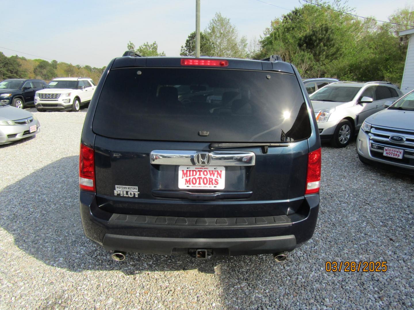 2011 Blue Honda Pilot EX-L 2WD 5-Spd AT with DVD (5FNYF3H69BB) with an 3.5L V6 SOHC 24V engine, Automatic transmission, located at 15016 S Hwy 231, Midland City, AL, 36350, (334) 983-3001, 31.306210, -85.495277 - Photo#7