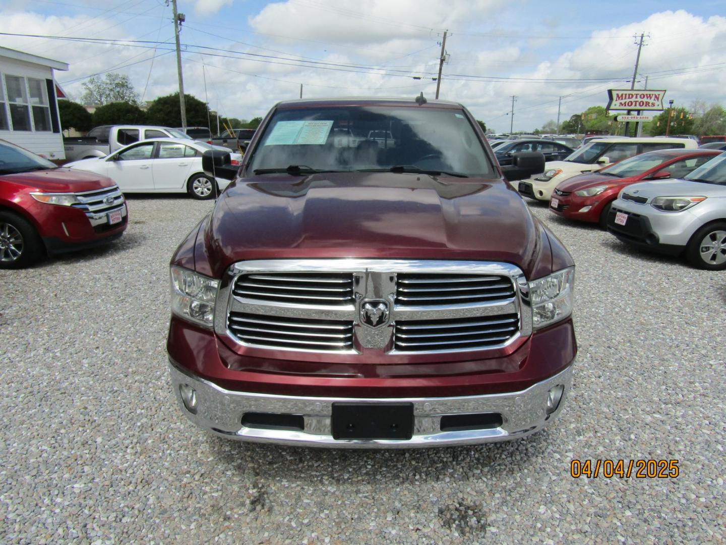 2017 Burgandy RAM 1500 SLT Crew Cab SWB 4WD (3C6RR7LT3HG) with an 5.7L V8 OHV 16V engine, Automatic transmission, located at 15016 S Hwy 231, Midland City, AL, 36350, (334) 983-3001, 31.306210, -85.495277 - Photo#2