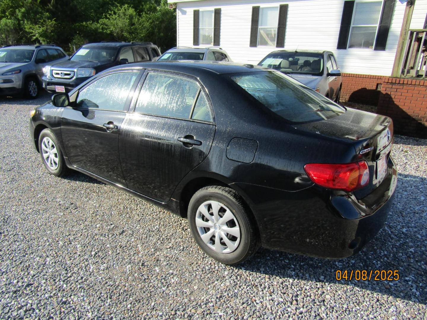 2010 Black Toyota Corolla Base 4-Speed AT (2T1BU4EEXAC) with an 1.8L L4 DOHC 16V engine, Automatic transmission, located at 15016 S Hwy 231, Midland City, AL, 36350, (334) 983-3001, 31.306210, -85.495277 - Photo#5