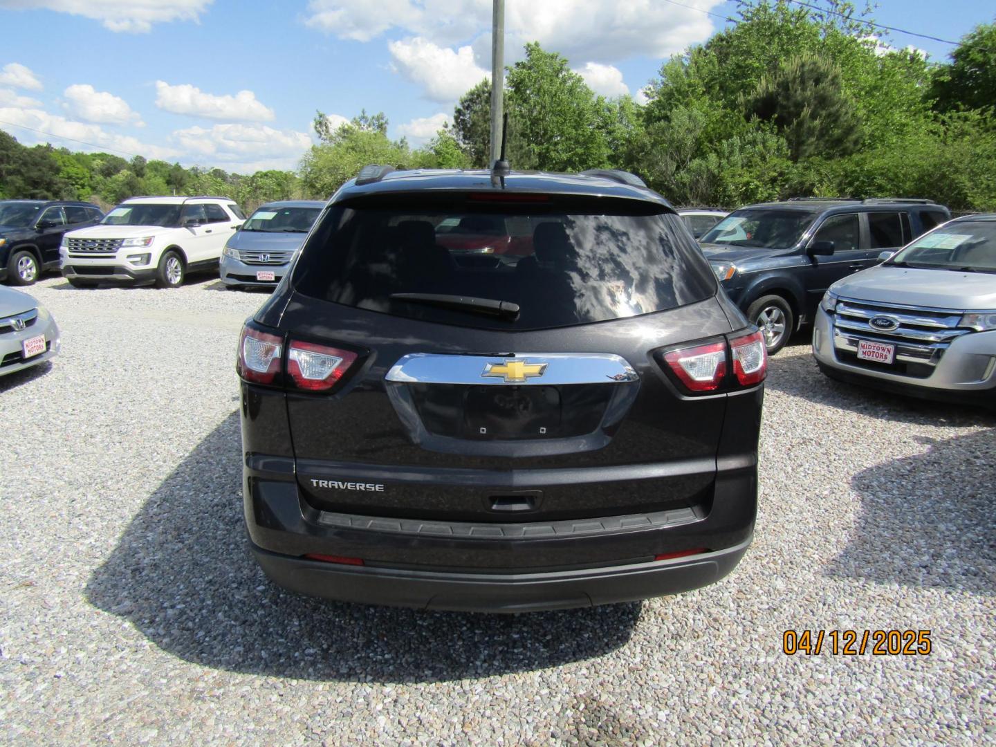2017 Gray Chevrolet Traverse LS FWD w/PDC (1GNKRFEDXHJ) with an 3.6L V6 DOHC 24V engine, Automatic transmission, located at 15016 S Hwy 231, Midland City, AL, 36350, (334) 983-3001, 31.306210, -85.495277 - Photo#5